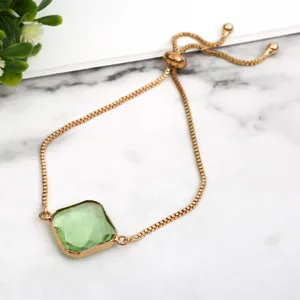 Exquisite adjustable gold bracelet featuring a square light green crystal charm for women