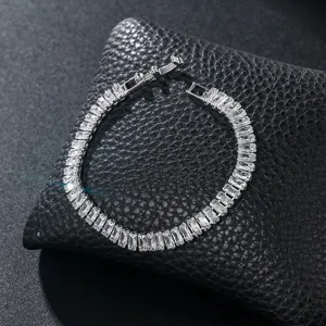 Elegant baguette cubic zirconia tennis bracelet for women, stunning silver tone metal detail.