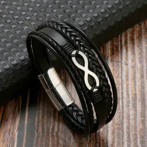 Men's multi-layer braided leather bracelet with stainless steel infinity symbol and magnetic clasp detail.