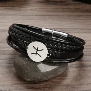 Men's multi-layer braided leather bracelet with stainless steel zodiac charm and magnetic clasp.