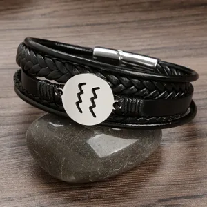 Men's multi-layer black leather braided bracelet with stainless steel zodiac pendant.