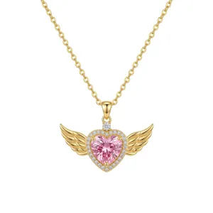 Close-up details of the gold winged heart pink zircon pendant necklace, exquisite jewelry accent.