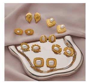 Stainless steel 18k gold plated geometric pearl stud earrings detail view, elegant women fashion jewelry.