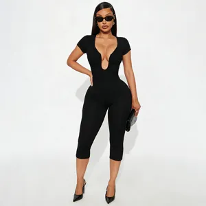 Detail view of women black ribbed short sleeve u-neck cropped jumpsuit stretch fabric.