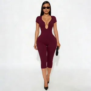 Solid color deep U-neck cap sleeve cropped stretchy jumpsuit for stylish fashion womenswear.