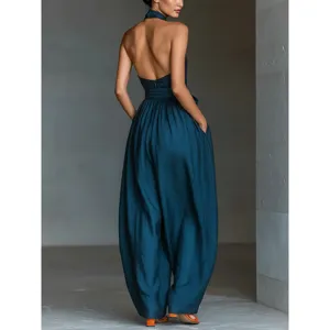 Women's backless halter linen wide-leg jumpsuit, elegant casual summer back view outfit.