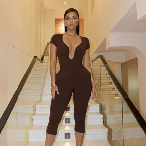 Women slim solid color deep U-neck short sleeve cropped jumpsuit detail view showing fit.