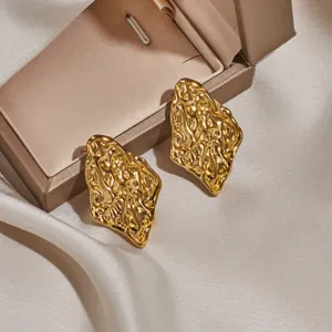 Gold irregular metal stud earrings for women, minimalist fashion stainless steel jewelry design.