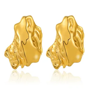 Gold irregular molten metal stud earrings for women and men, chic abstract geometric jewelry.