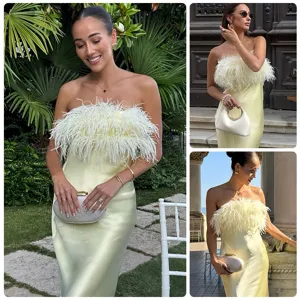 Elegant strapless satin long dress with fluffy feather detail, perfect for evening parties and events.