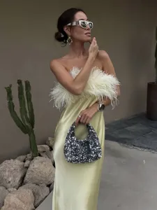 Sexy strapless satin long dress with fluffy feather splicing, elegant slim fit design.