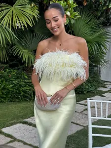 Strapless satin long dress with fluffy feather bust detail for elegant evening party wear.
