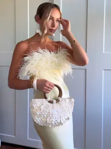 Sexy strapless satin slim long dress with fluffy feather trim and elegant style detail.