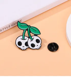 Punk style alloy enamel brooch featuring a unique skull and cherry design for clothing.
