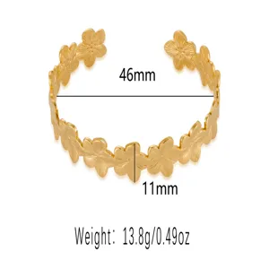 Detail view of gold stainless steel flower motif open cuff bracelet showing dimensions.