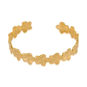 Gold floral cuff bracelet, stainless steel 18k gold plated, stylish open bangle jewelry detail.