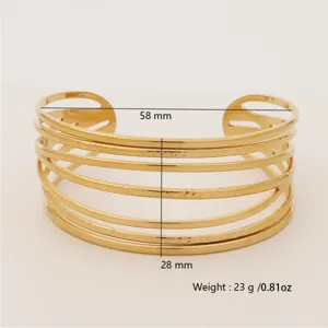 Gold wide multi-strand open cuff bracelet detail showing 58mm diameter and 28mm width.