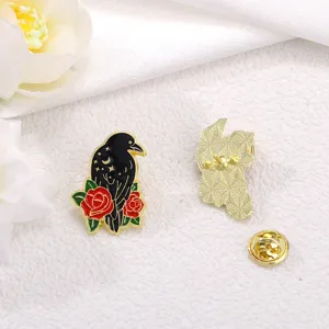 Gothic raven enamel pin with red roses and starry sky design, creative alloy clothing badge.