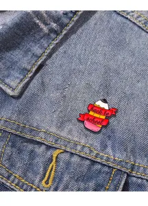 School theme pencil enamel pin detail shot, creative alloy badge for jacket decoration.