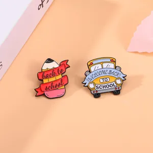 Back to school enamel pin set featuring cute pencil and yellow bus designs for bags and clothes.