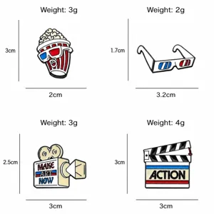 Cartoon cinema enamel pin set featuring popcorn, projector, 3d glasses and clapperboard.