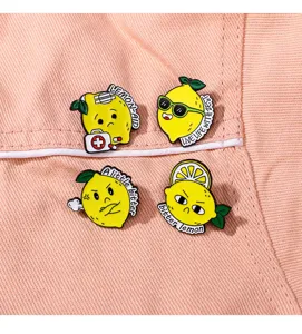 Close-up detail of cute cartoon lemon enamel pins set, featuring fun expressions and witty quotes.