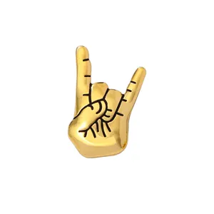 Gold rock hand gesture brooch alloy lapel pin vintage concert fashion clothing accessories badge