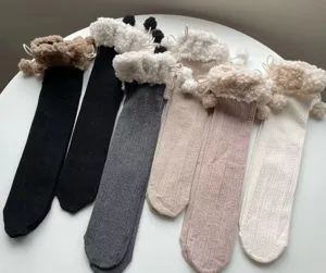 Autumn winter cozy fuzzy cuff cable knit slouch socks for women warm cute pom pom mid calf socks