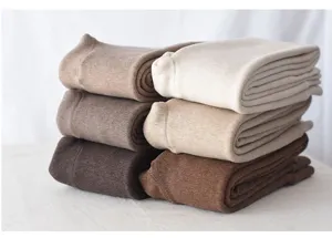 Winter thick fleece-lined thermal leggings stacked in multiple colors, soft and cozy basic tights.