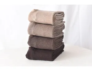 Detailed view of winter fleece lined thermal leggings in stacked colors, soft and thick.