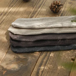 Close-up detail of winter vertical ribbed knit pantyhose showing soft cotton texture and knit quality.