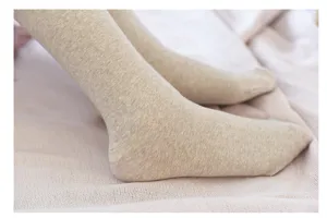 Detail view of the autumn winter thick fleece lined ribbed tights in oatmeal color, soft.