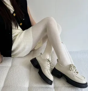Autumn and winter warm textured knit tights with platform shoes, elegant and stylish.