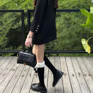 Women cute pom pom knee high socks winter warm cable knit stacking socks black and white style