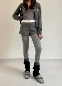 Grey polka dot thermal leggings styled with chic knit cardigan for winter cozy daily outfits.