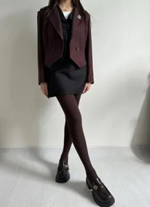 Detail view of autumn winter warm knit tights for women, versatile water ripple style hosiery.