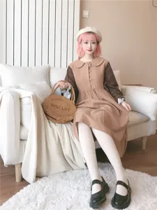 Detail view of oatmeal milk apricot vertical stripe high-waist women tights in cozy indoor setting