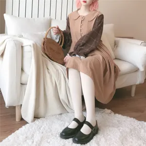 Cozy oatmeal apricot tights worn by a model in a bright living room interior setting.