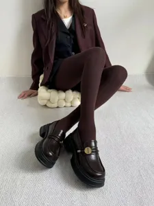 Brown herringbone knit pantyhose winter warm tights vintage retro dark academia aesthetic detail.