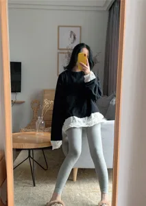 Detail view of women casual grey cropped leggings high waist comfortable daily wear style.