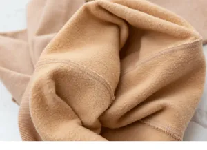 Detail shot of winter thick fleece lined leggings, super soft warm interior texture fabric.