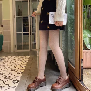Oatmeal fleece lined stirrup tights, thick thermal winter leggings for warm daily wear.
