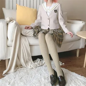 Cozy oatmeal beige tights detail shot, soft cotton blend hosiery, warm autumn style.