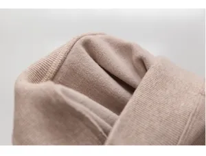 Close-up detail of women's thick warm winter fleece lined leggings inner plush fabric texture