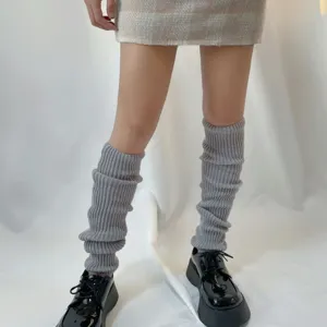 Grey knitted leg warmers detail shot, autumn winter warm basic lengthened knit leg covers.