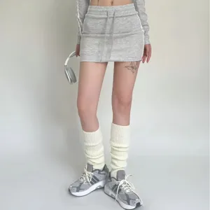 White knitted leg warmers for women, cozy winter long pile socks, soft fashion thermal boot cuffs.