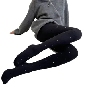 Thickened fleece-lined polka dot tights for women, winter warm slimming base leggings in black.