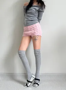 Detailed view of Japanese style grey over-the-knee stacked socks for women, winter fashion