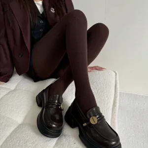 Women's warm winter knit tights in rich dark brown featuring a stylish herringbone texture.