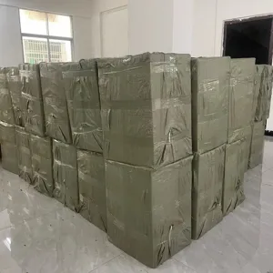 Detailed view of bulk industrial packaged storage bales secured with woven sacks for shipping.